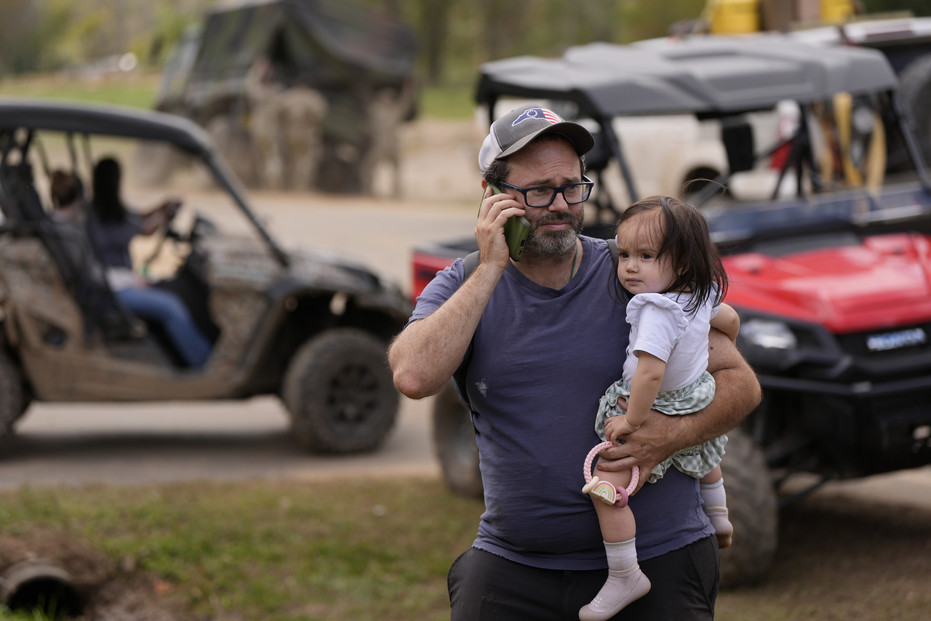 A man makes a call on a wireless system set up at a volunteer fire department in North Carolina last year in the aftermath of Hurricane Helene. A man makes a call on a wireless system set up at a volunteer fire department in North Carolina last year in the aftermath of Hurricane Helene.