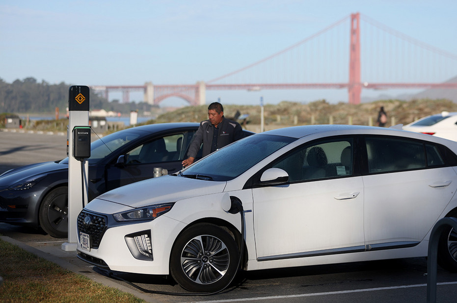 Electric vehicles are pictured being recharged at the East Crissy Field charge station on March 9 in San Francisco.