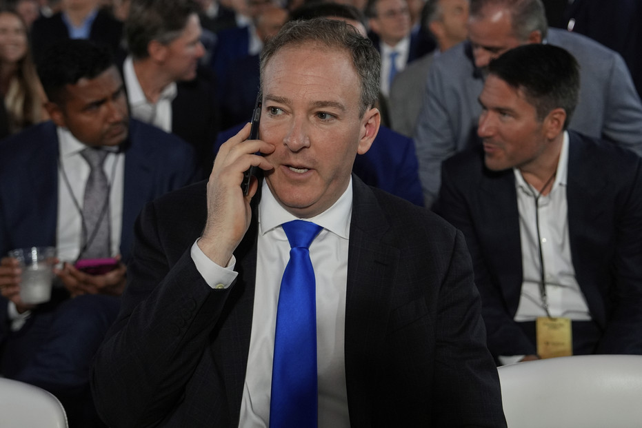 EPA Administrator Lee Zeldin talks on the phone during an AI summit in Washington.