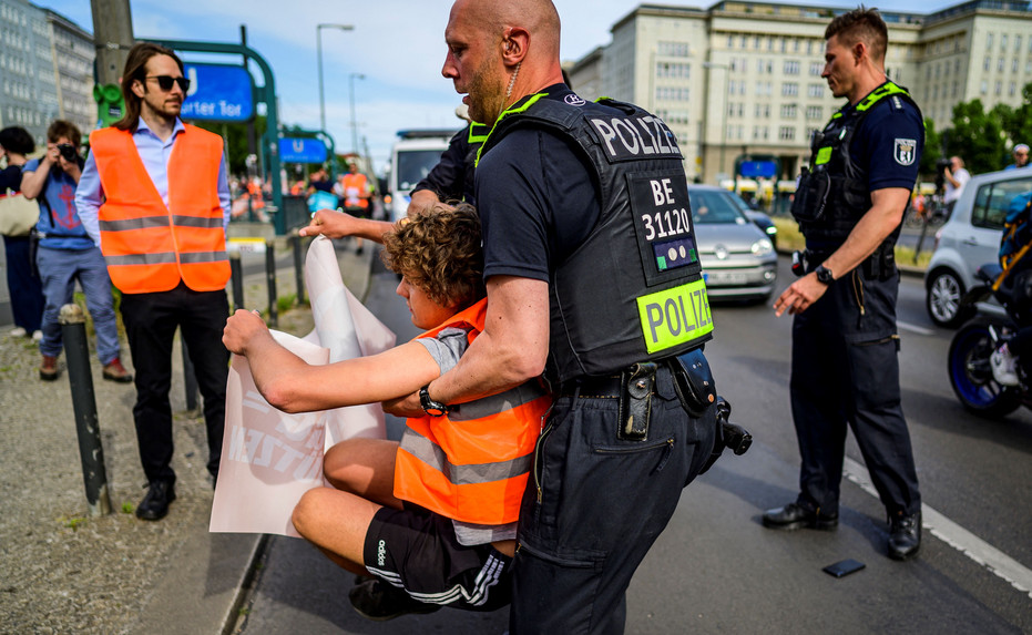 German police conduct raids on climate activists as impatience mounts